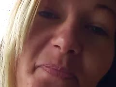 Busty mature blonde shows her body during her cigarette pause